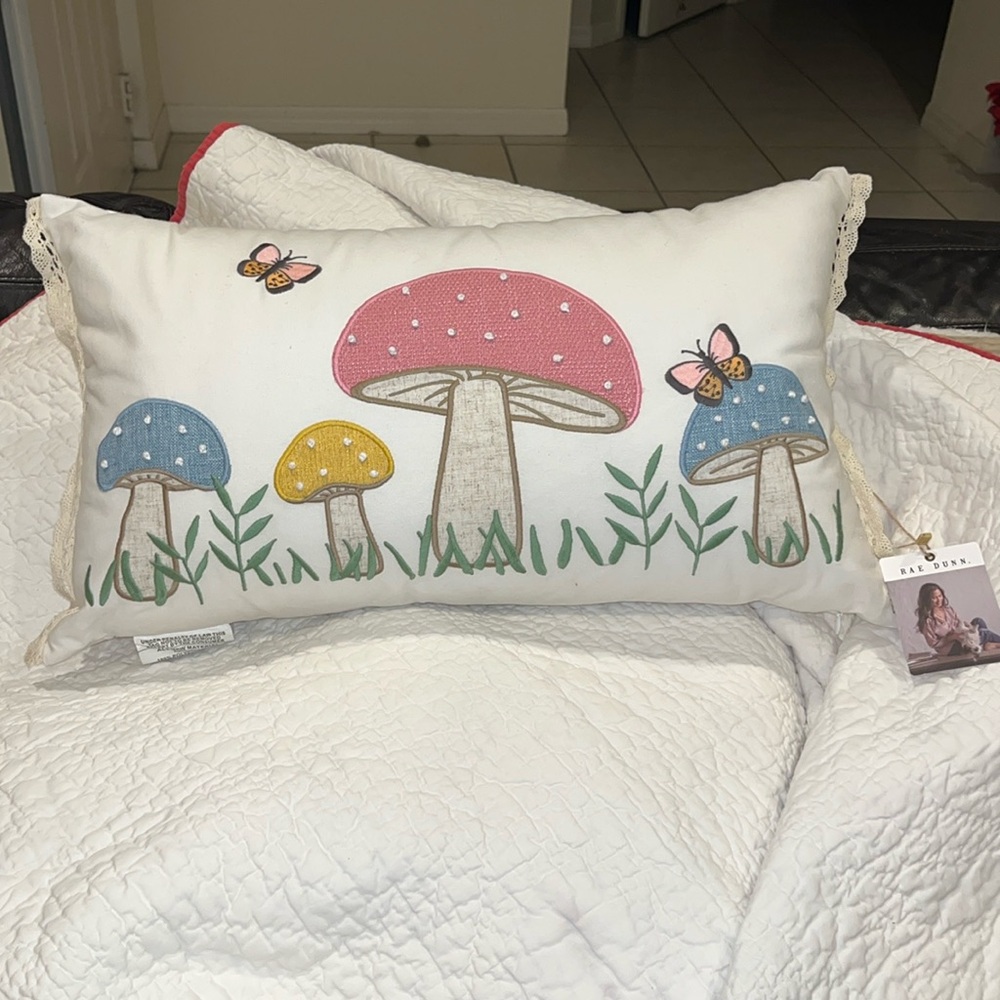 Rae Dunn pink yellow and blue mushroom throw pillow